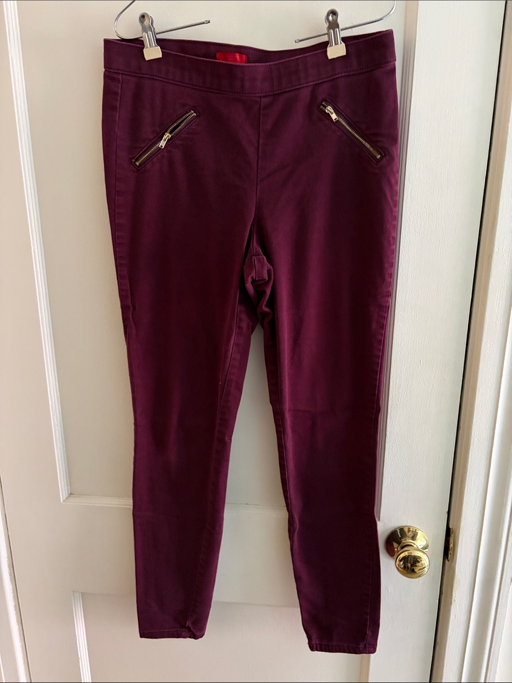 Jennifer Lopez Burgundy Skinny Pants with Gold Zippers
